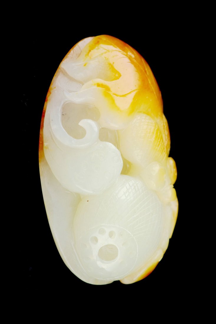 CHINESE WHITE JADE CARVED PENDANT: Chinese white jade carved pendant, seed material with fish, lotus and ruyi, size: 2.16 x 1.43 x 0.79", 63.97 g.