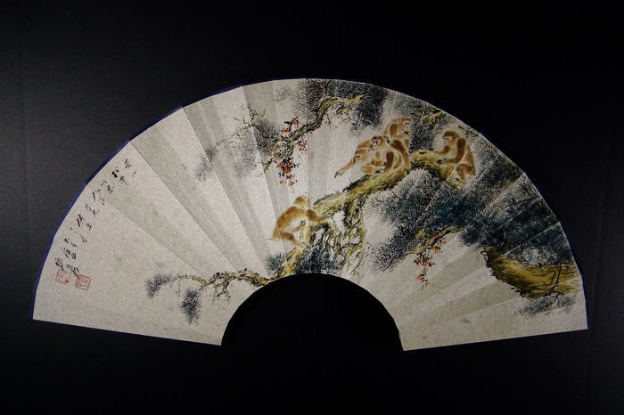 CHINESE PAINTING FAN BY ZHANG DAQIAN: Chinese painting fan by Zhang Daqian (1899 to 1983), the modern Chinese painter and a master of traditional Chinese ink painting of the 20th century Chinese painting. The painting with few monkeys pla