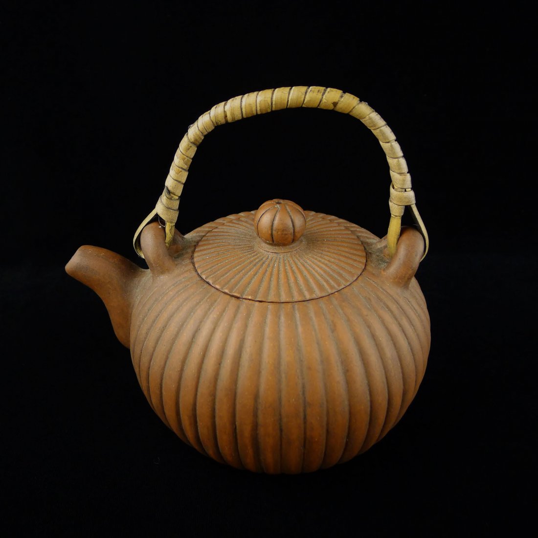 CHINESE YIXING CLAY TEAPOT: Chinese Yixing Clay Teapot, signed and a seal mark on the bottom, 6" x 5" x 5".