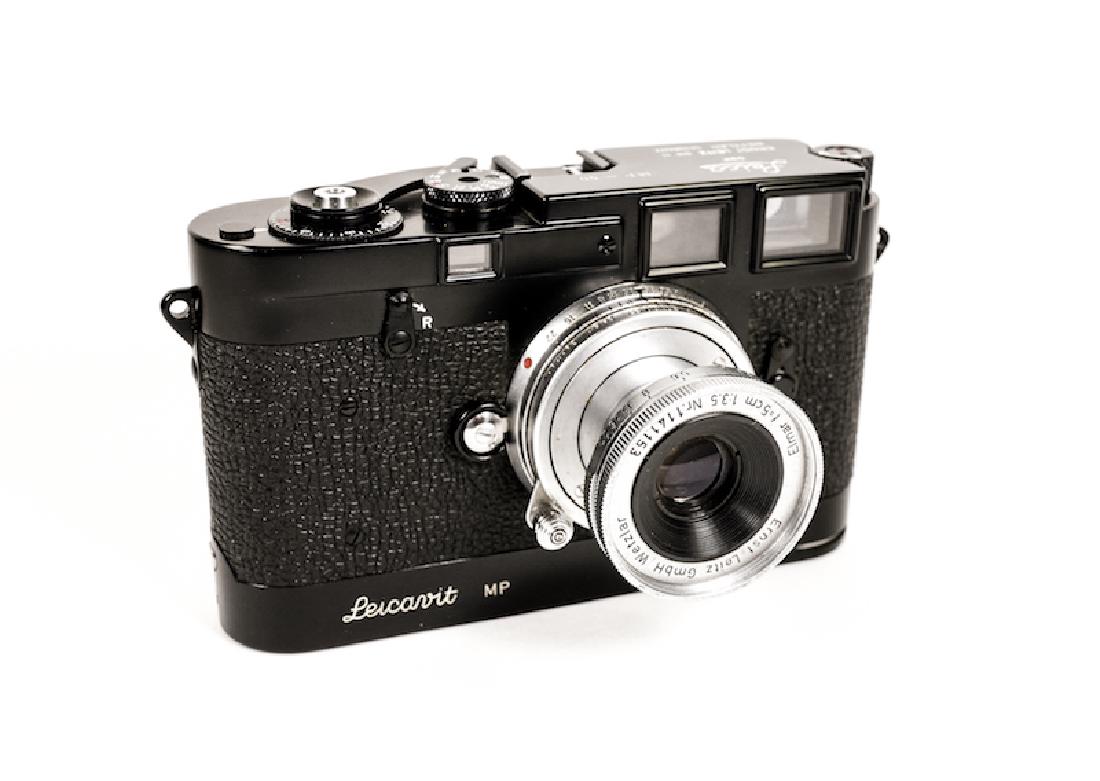 Leica MP Black Enamel Nr. 50: Leica MP Black Enamel Nr. 50 with Leicavit rapid winder, also finished in Black Enamel finish, with 50mm Elmar f3,5 Nr. 1141153. This remarkable camera set came out of 50 years of storage, untouched.