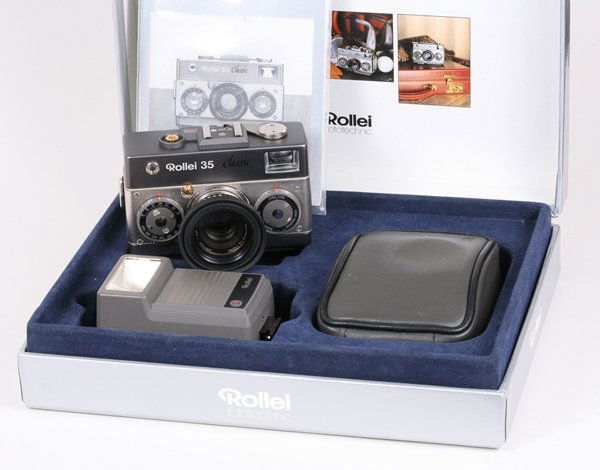 Rollei 35 Classic Titanium with case Nr. 6101195.: Rollei 35 Classic Nr. 6101195 Titanium with case, instructions, flash, and presentation box.
