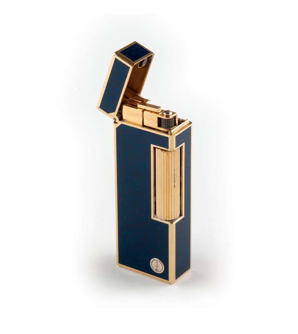Dunhill Blue Enamel Lighter.: A traditional men’s gold plated, blue enamel lighter with side scrolling strike bar. Double signed on bottom and inner case lid. Cobalt color design, 65mm x 24mm x 13mm, Signed Dunhill on base. Made