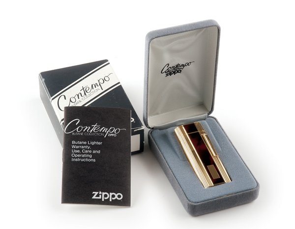 Zippo Contempo Lighter.: Zippo #1416 Contempo, butane lighter, in tortoise finish. New in box, with seal still affixed to lighter. Includes the inner box, outer box and instruction booklet.
