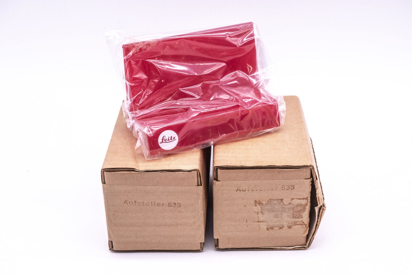 Two red plastic Leitz camera stands for the Leica camera, marked “Leitz" (1 of 9)