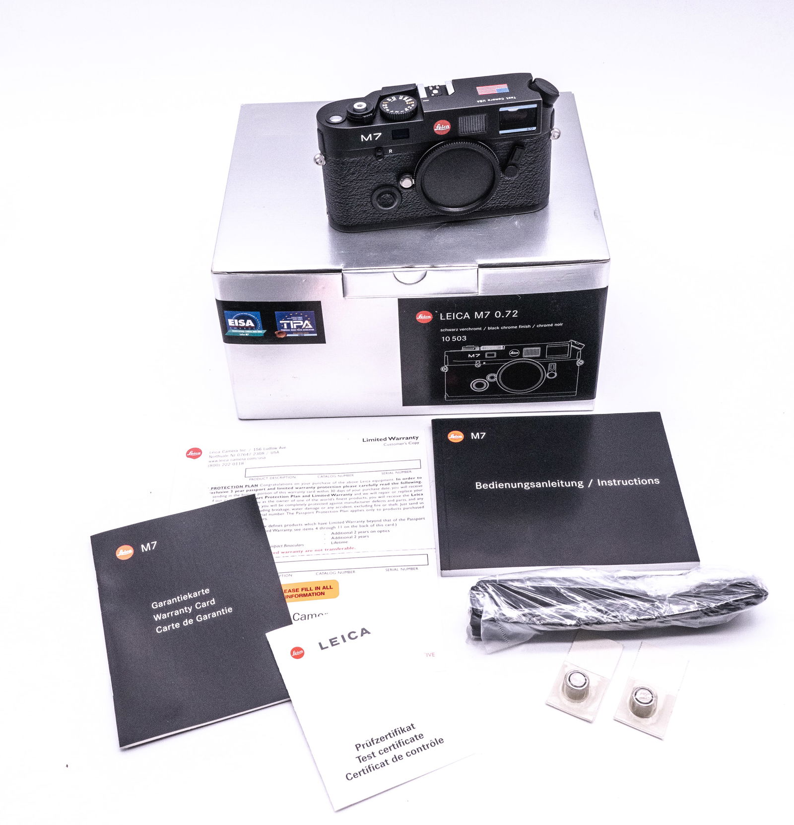 Leica M7 .72 Black “Test Camera USA": Leica M7 .72 Black “Test Camera USA” Nr. 2782221, complete in box with strap, instruction booklet, warranty documents and test certificate. Unused, and like new despite some lifting vulcanite