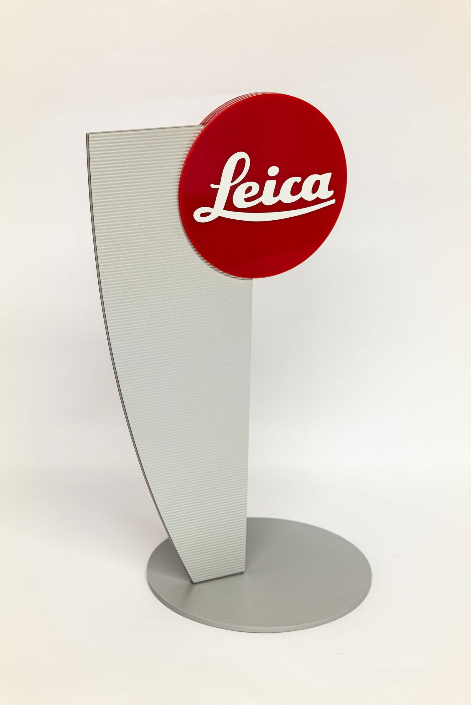 Leica metal standing display on round base (1 of 8)