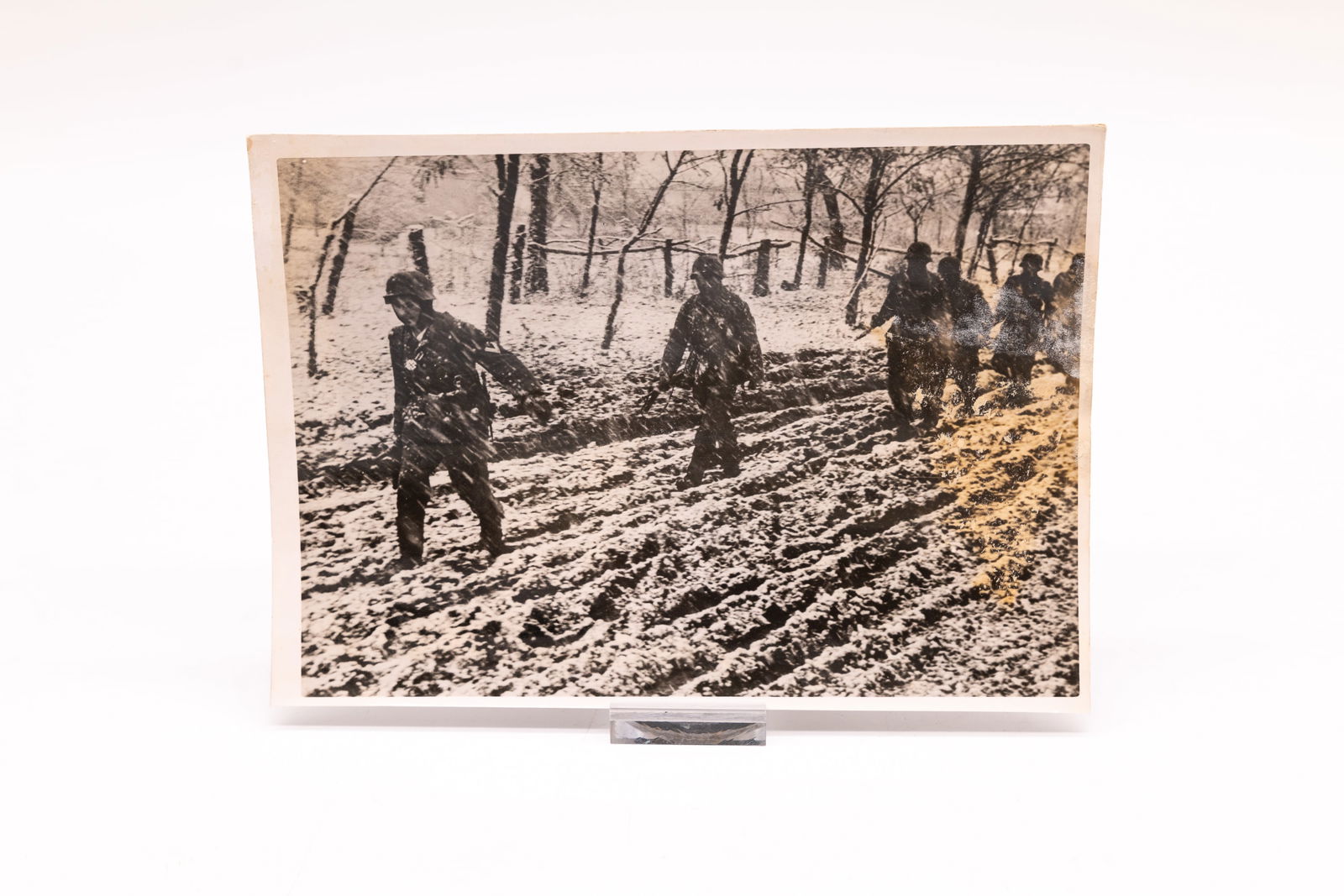 Four original photographs by Heinrich Hoffmann: Four original photographs by Heinrich Hoffmann, showing scenes from 1943, including German officers celebrating Christmas. These 5x7-inch photos bear Hoffmann's studio's oval stamp en verso. Condition