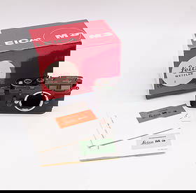 Leica M3 Double Stroke in black paint finish: Leica M3 Double Stroke Nr. 855688 in black paint finish. Made in 1957, this camera is working. A gorgeous example of the collectible black paint Leica M3 camera, with unnumbered original box and instr