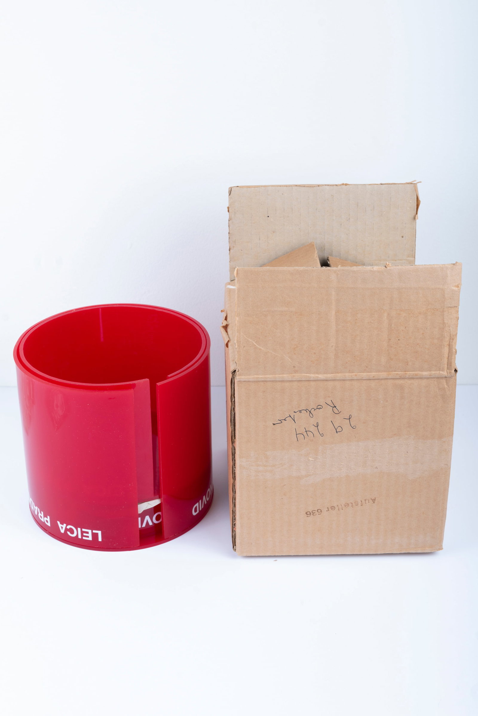 Three nesting red plastic display columns - 5