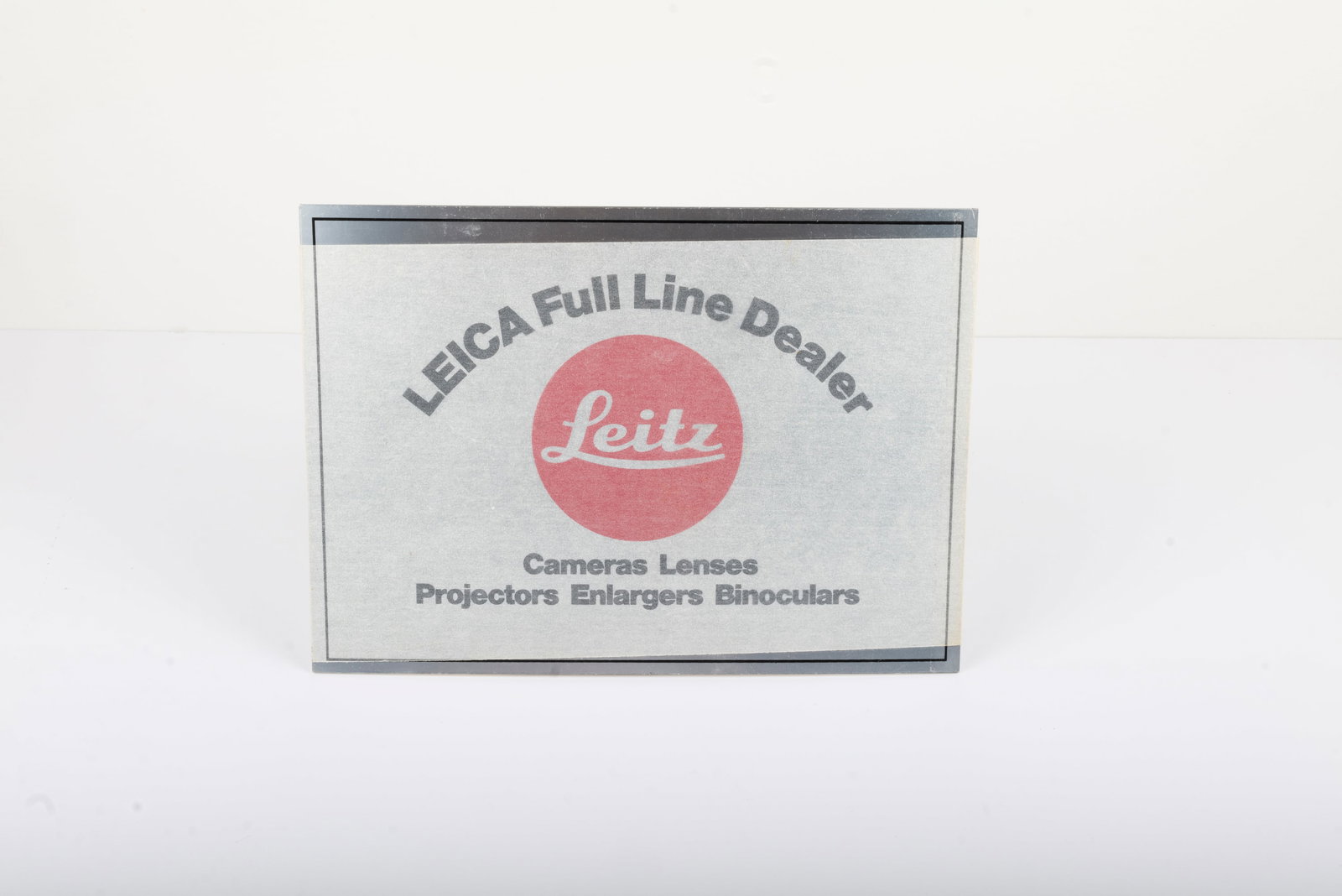 Leica Full Line Dealer sign: "Leica Full Line Dealer" sign, measuring approximately 10" by 7" Condition: Excellent ++