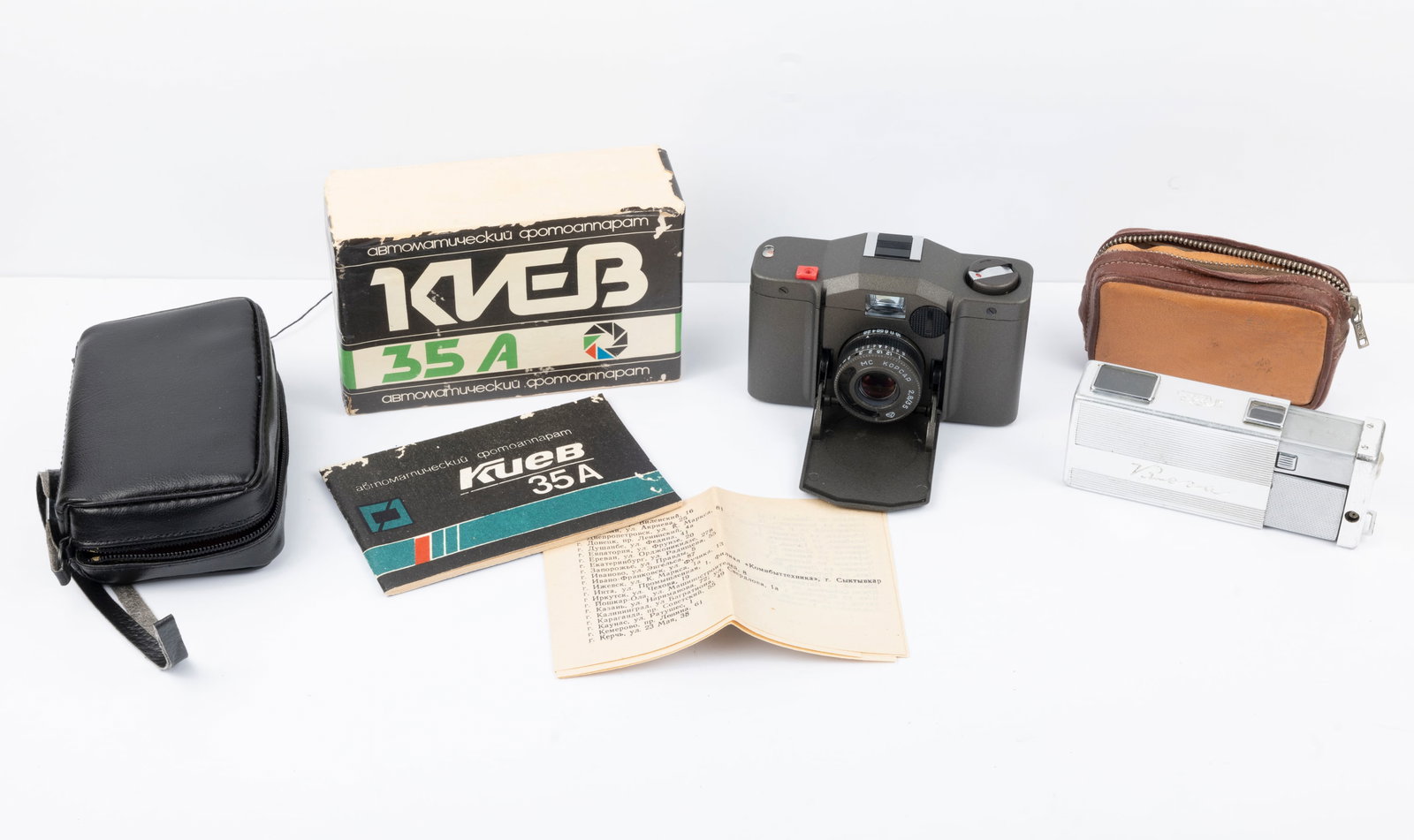 Two Kiev miniature cameras: Two Kiev miniature cameras modeled after Minox products: Kiev-35 and Kiev-Vega. The Kiev-35 Nr. 35A9213864 comes in its case and box with original instructions booklet and was made in 1993. The Kiev-V