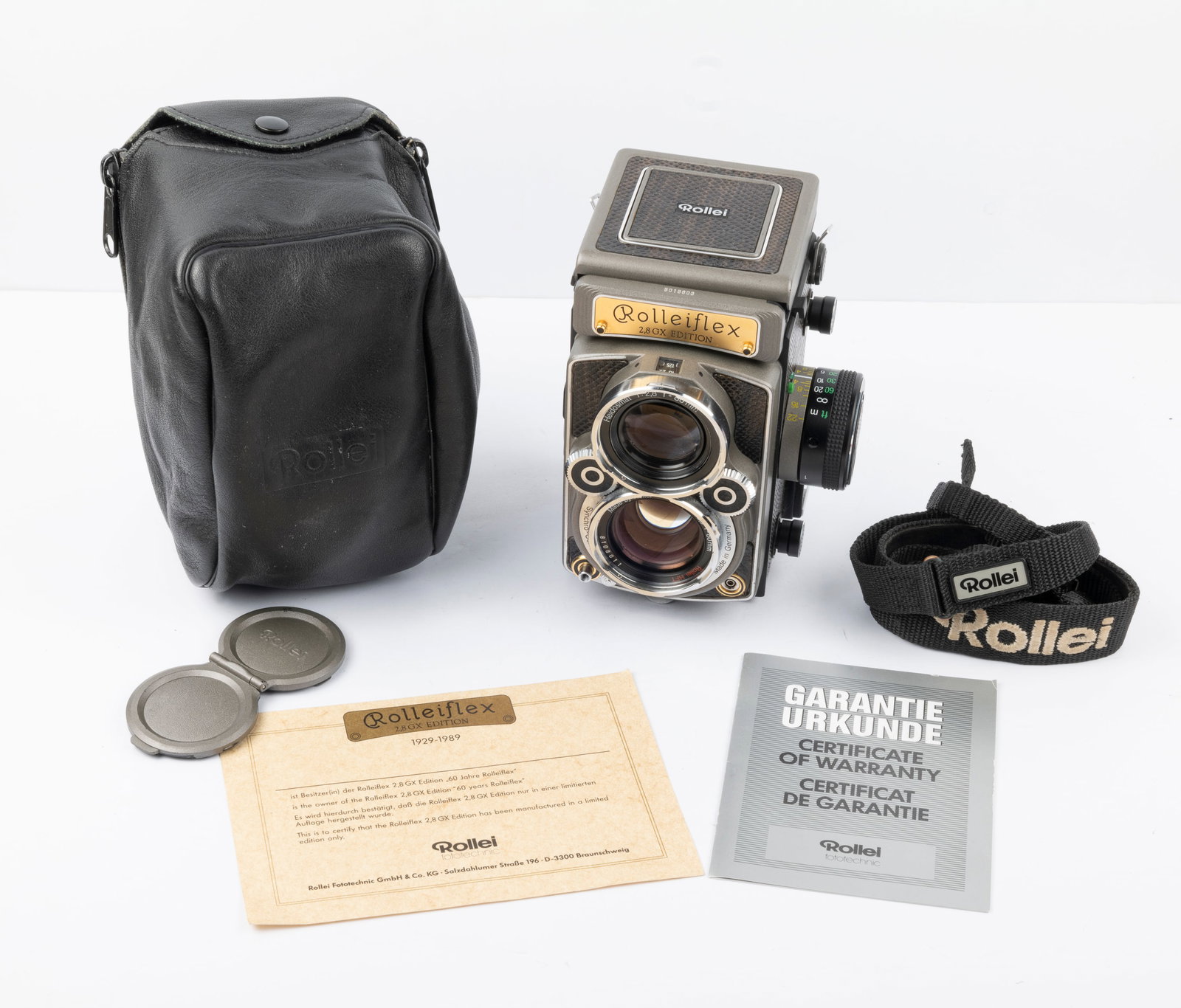 Rolleiflex 2,8 GX Edition "60 Jahre Rolleiflex 1929-1989": Rolleiflex 2,8 GX Edition "60 Jahre Rolleiflex 1929-1989" Nr. 5015603, with soft leather ever-ready case, nylon strap, lens cap, certificate of warranty card, and Special Edition Certificate.