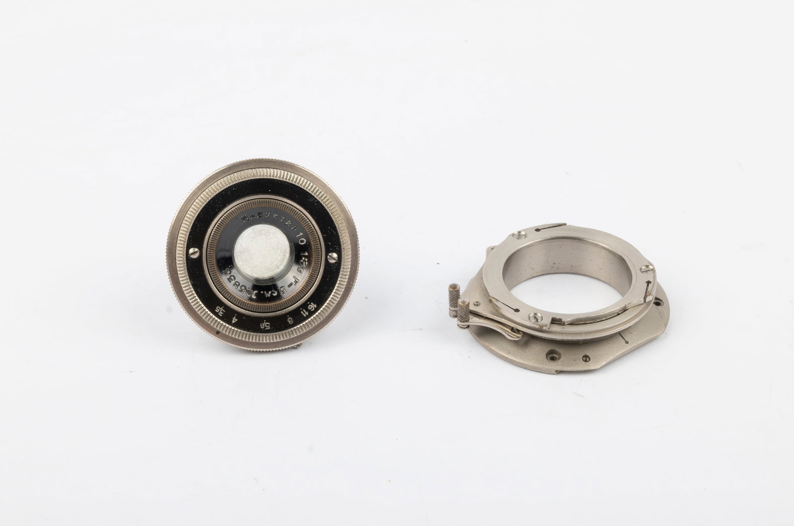Industar-10 50mm f3,5 lens Nr. 5835: Industar-10 50mm f3,5 lens Nr. 5835, with lens mount, finished in nickel, and made in the 1930s, likely from a GOMZ sport camera. Condition: Excellent + overall