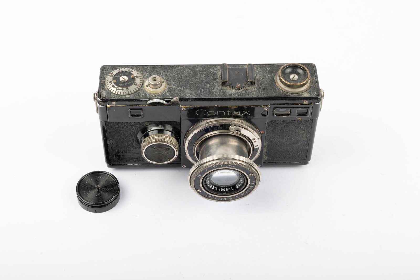 Contax I (Model A) Nr. AU49669: Contax I (Model A) Nr. AU49669 with 5cm Carl Zeiss Jena Tessar f2,8 Nr. 1352748. The frame counter plate is engraved "Made in Germany" and a film cassette is included. Condition: Very Good