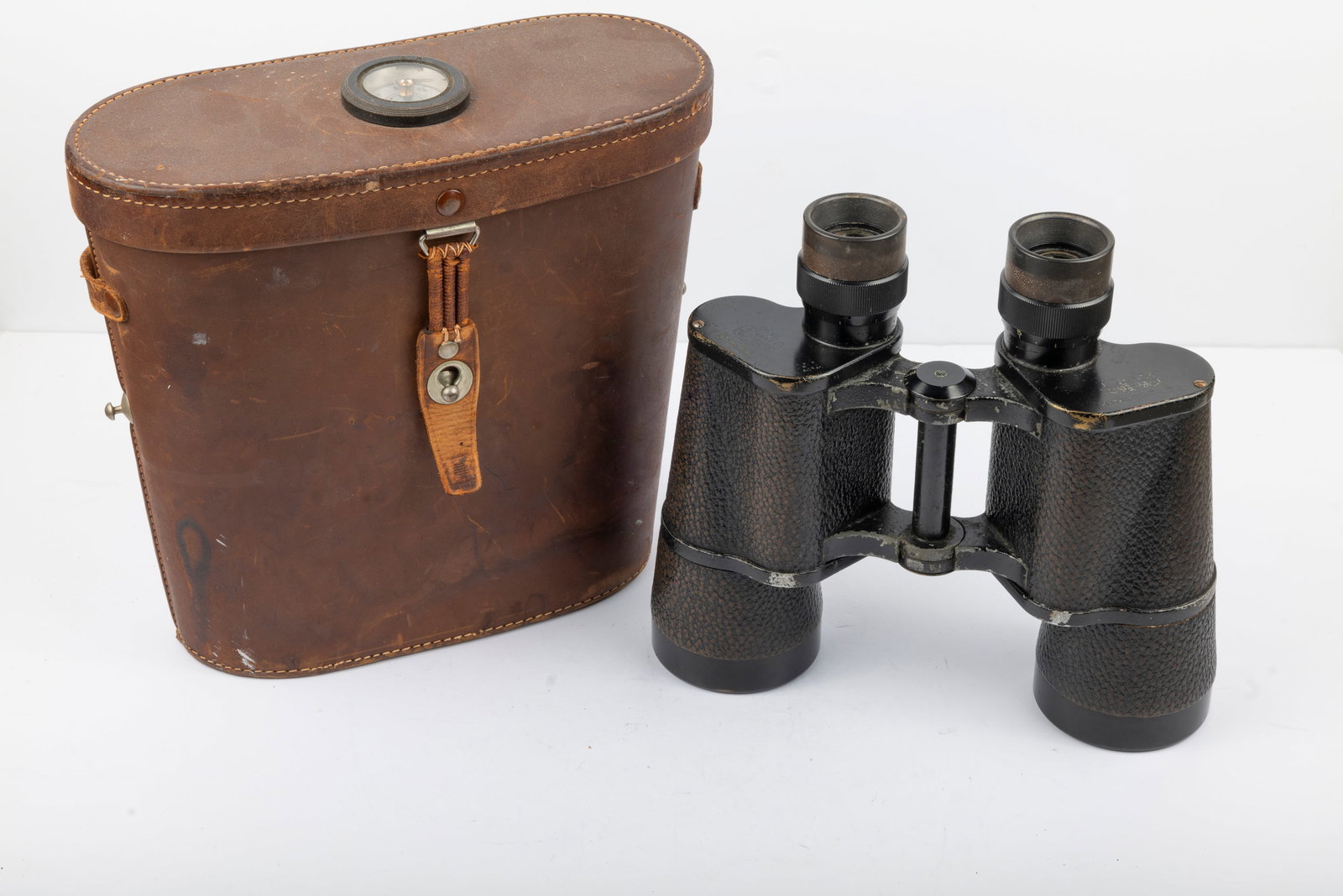 Zeiss Jena 7x50 Binoctar: Zeiss Jena 7x50 Binoctar Nr. 1394694. Engraved "F.W. Horenburger" and "No. 8583-1942" which appears to be the name and loan number to the U.S. Navy in 1942. In brown leather case with compass