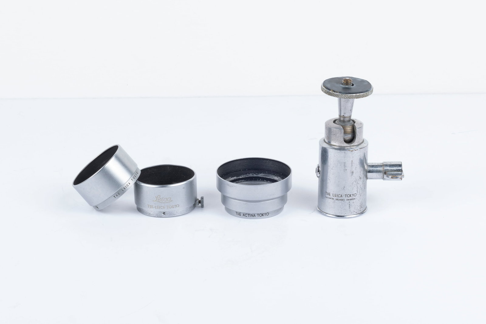 The Leica Tokyo accessories: "The Leica Tokyo" accessories. Made in Japan shortly after World War II, these accessories are hard to find. The two shallow lens shades have slightly different engravings and are modeled after the