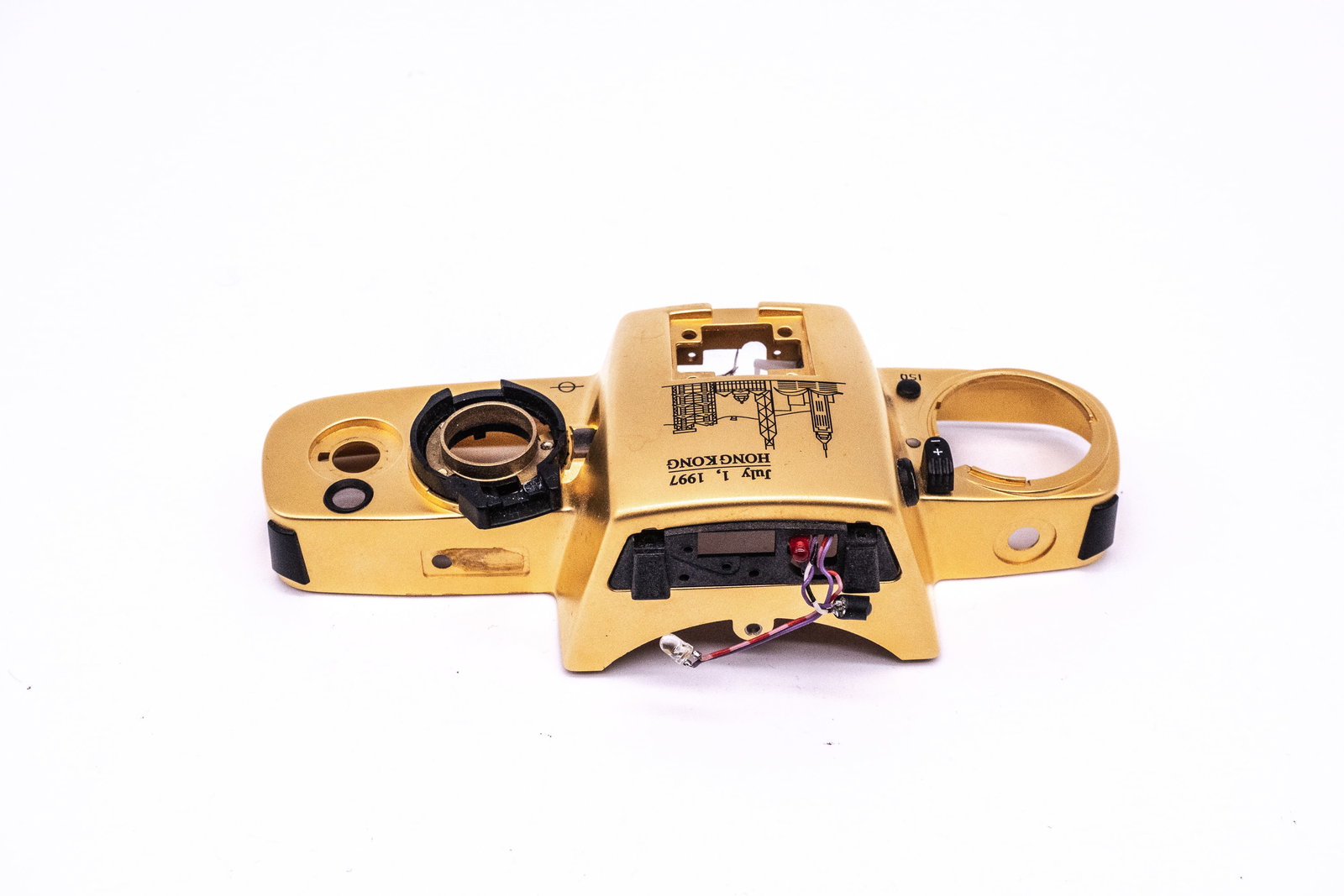 Two Leica R6,2 gold top plates: Two Leica R6,2 gold top plates. One is marked “July 1, 1997 HONG KONG” to commemorate the reunification of Hong Kong with China. The other top plate is marked “30 My Singapore My