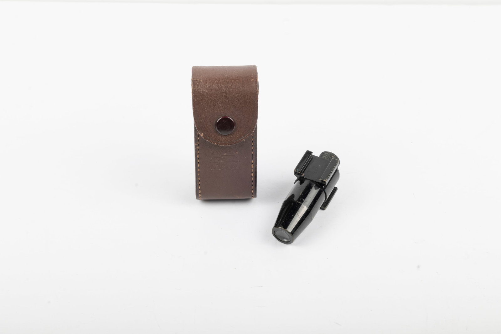 Universal Torpedo Viewfinder VIDEO: Universal Torpedo Viewfinder VIDEO, circa 1932, with framelines for 35mm, 50mm 73mm, and 105mm lenses, with original leather case, marked "E. Leitz New York"Condition: Excellent