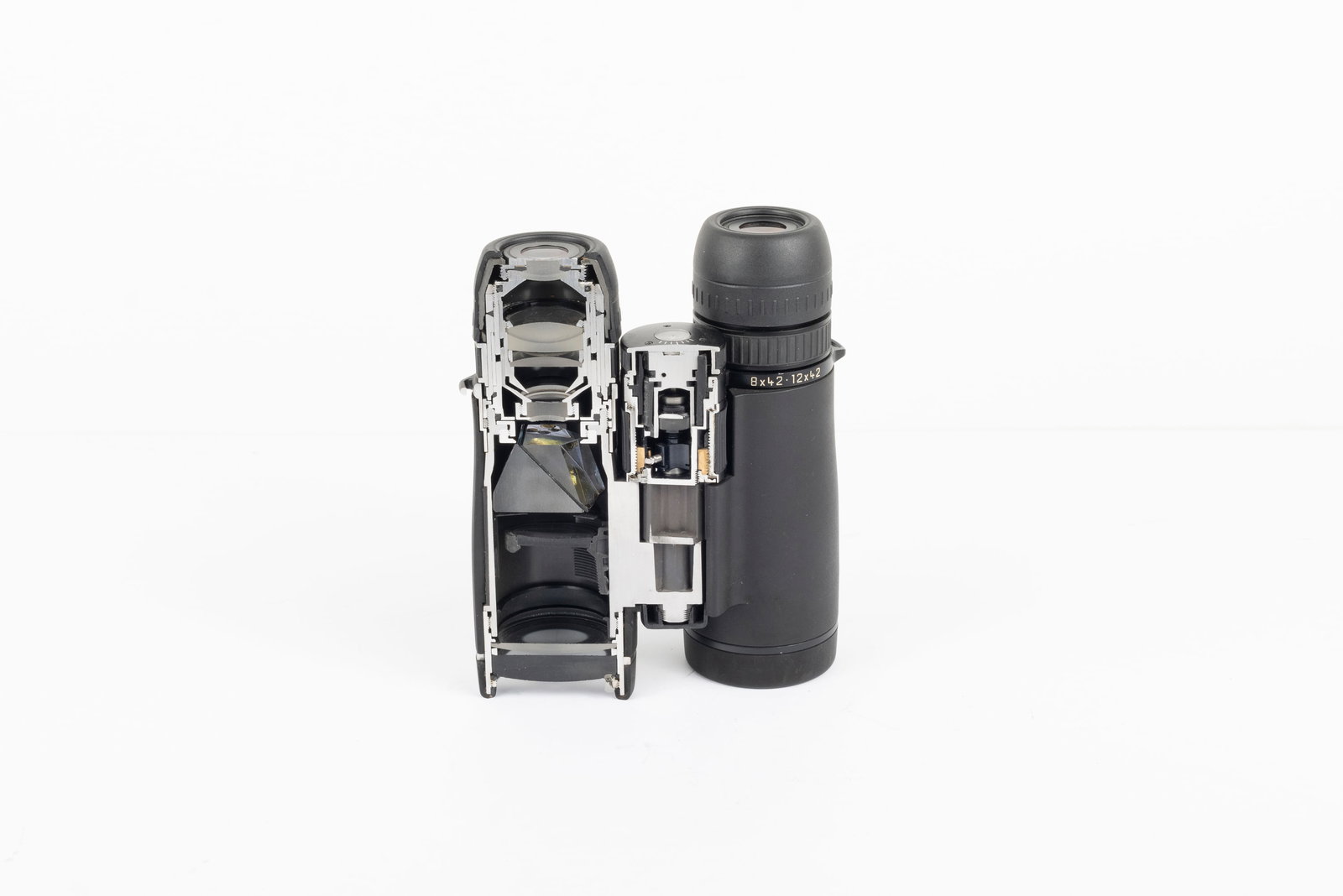 Leica Duovid 8x42/12x42 Cutaway: Leica Duovid 8x42/12x42 Cutaway (no serial number). There is some de-silvering of inner optics. Condition: Very Good