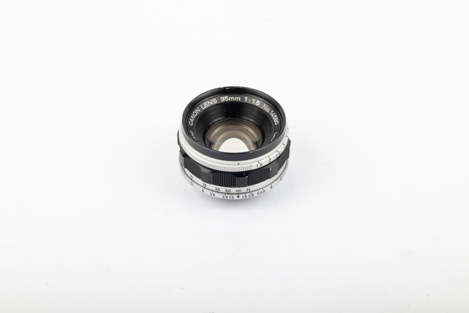 Canon 35mm Canon Lens f1,5 Nr. 14580: Canon 35mm Canon Lens f1,5 Nr. 14580, in Leica screw mount. The aperture blades of this lens have been removed. Recently serviced, this lens is clean and clear and ready to make beautiful portraits.