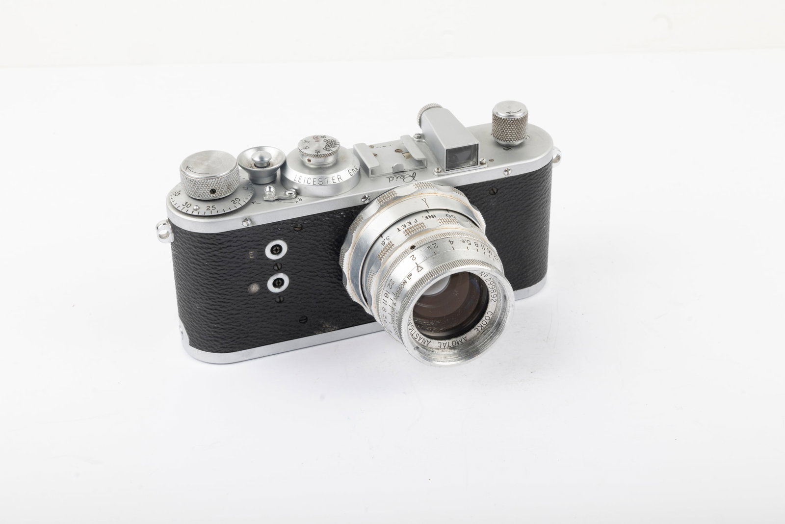 Reid I: Reid I Nr. P2151 with 2-inch Cooke Amotal-Anistigmat f2 ELC Nr. 299892. Introduced in 1958 (years after the Reid III), this camera bears Royal Navy numbers embossed on the back of the camera: