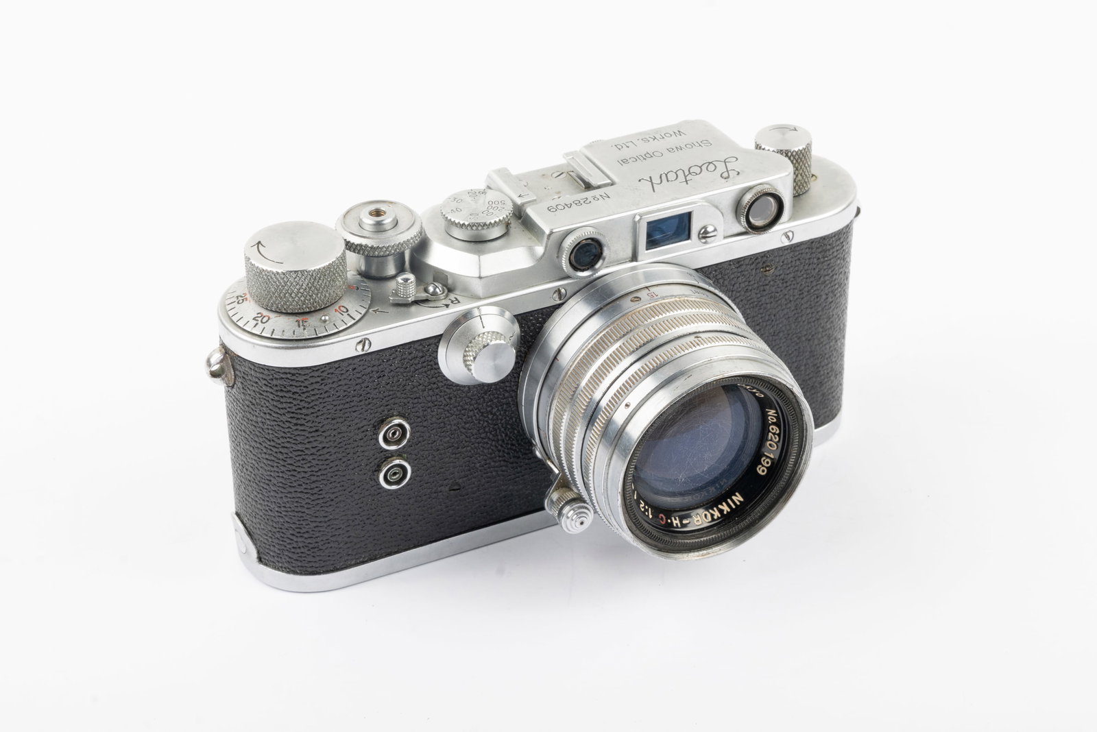 Showa Leotax S: Showa Leotax S, Nr. 28409 with 5cm Nikkor-H-C f2 Nr. 620199, made circa 1952. The camera is working, and the lens shows haze and cleaning marks. Condition: Excellent overall