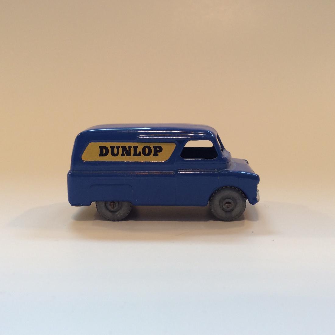 Vintage Lesney Matchbox #25 Bedford Van Dunlop Tires: Vintage Lesney Matchbox #25 Bedford Van Dunlop Tires Metal Wheels in Excellent condition from 1956. Made in 1956 in England. Blue Body, "Dunlop" Decals, Silver Front Grille, Black Metal Base, Crimp an