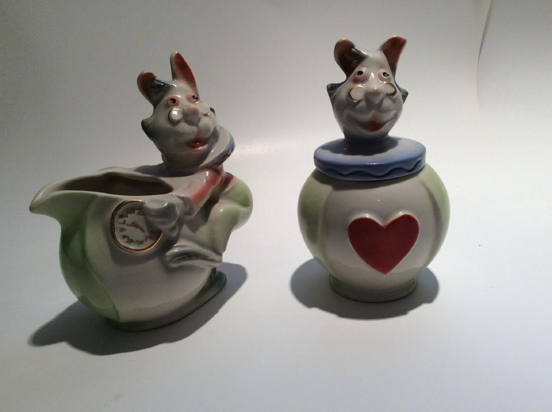 WHITE RABBIT DISNEY SUGAR/CREAMER SET REGAL CHINA: "WHITE RABBIT" FROM ALICE IN WONDERLAND SUGAR/CREAMER SET BY REGAL CHINA.Pair is high quality c. 1948 - 1951 . Each is about 5.5" tall and marked on underside with character name and Disney copyright.