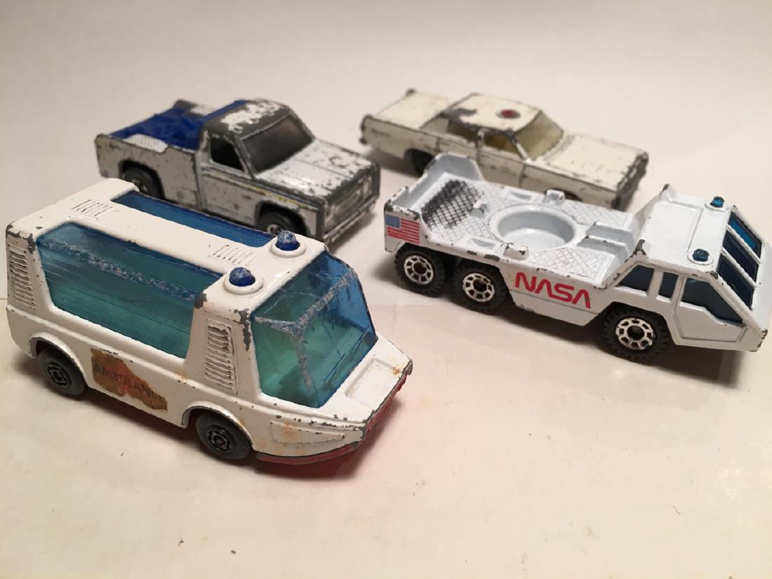 Collection of Hot Wheels and other Trucks: Collection of Hot Wheels and other Trucks with 4 trucks - one NASA vehicle