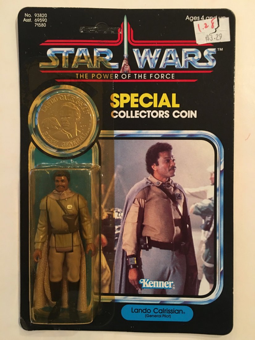 STAR WARS THE POWER OF THE FORCE LANDO CALRISSIAN: STAR WARS THE POWER OF THE FORCE LANDO CALRISSIAN VINTAGE KENNER 1984. Back shows collect all 92. Unpunched merchandising hanger. Small unnoticeable crack in blister pack - bottom left. Almost near MI