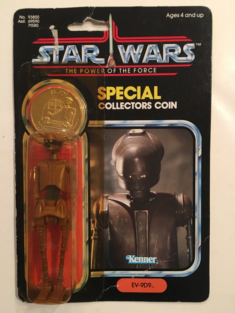 STAR WARS THE POWER OF THE FORCE EV-9D9: STAR WARS THE POWER OF THE FORCE EV-9D9 with collector coin. 1984. Back shows collect all 92. Merchandising cutout is punched. No dents in blister pack.