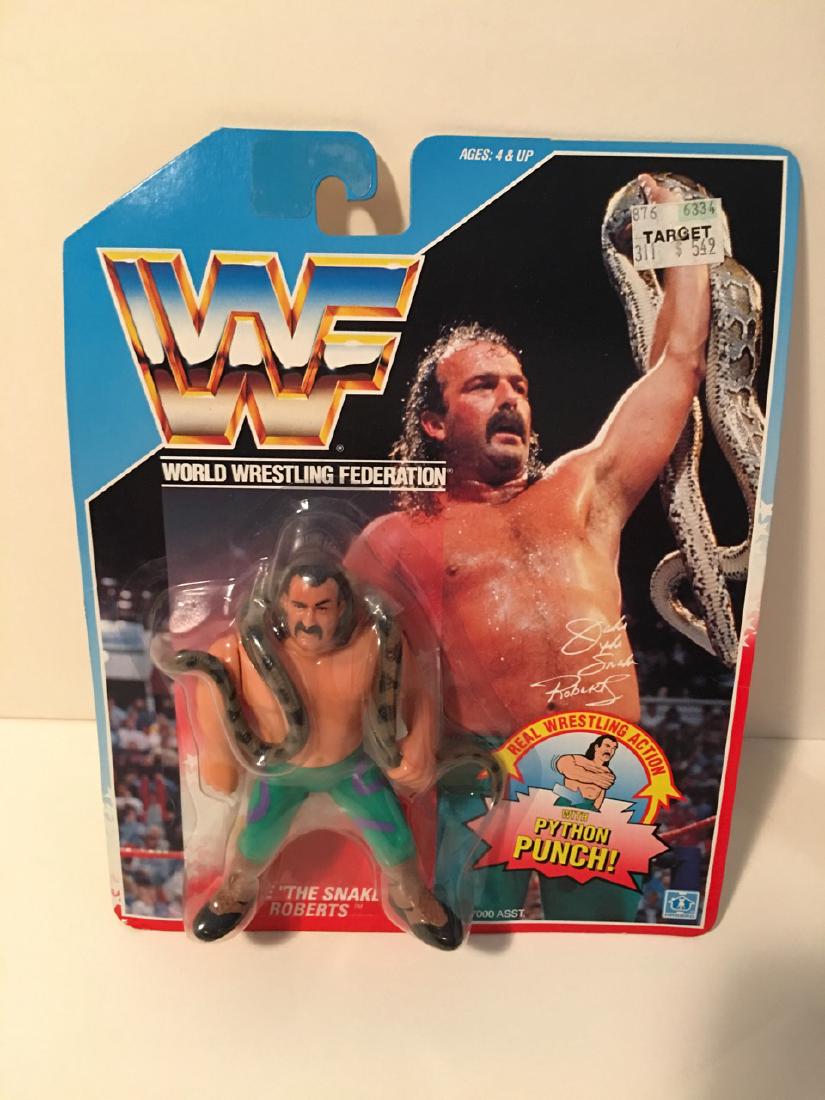WWF WRESTLING CHARACTER - JAKE THE SNAKE ROBERTS: WWF WRESTLING CHARACTER - JAKE THE SNAKE ROBERTS WITH REAL WRESTLING ACTION - PYTHON PUNCH. 1990 TITANSPORTS. HASBRO. NEW IN BOX.