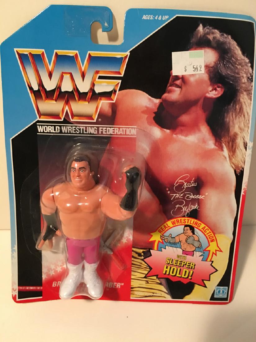 WWF WRESTLING CHARACTER - BRUTUS â€œTHE BEEFCAKEâ€: WWF WRESTLING CHARACTER - BRUTUS â€œTHE BEEFCAKEâ€ BARBER WITH REAL WRESTLING ACTION - SLEEPER HOLD. 1990 TITANSPORTS. HASBRO. NEW IN BOX.