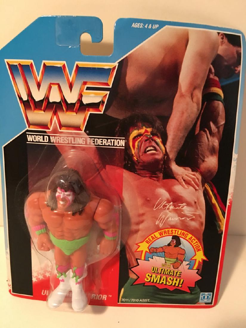 WWF WRESTLING CHARACTER - THE ULTIMATE WARRIOR: WWF WRESTLING CHARACTER - THE ULTIMATE WARRIOR WITH REAL WRESTLING ACTION - ULTIMATE SMASH. 1990 TITANSPORTS. HASBRO. NEW IN BOX.