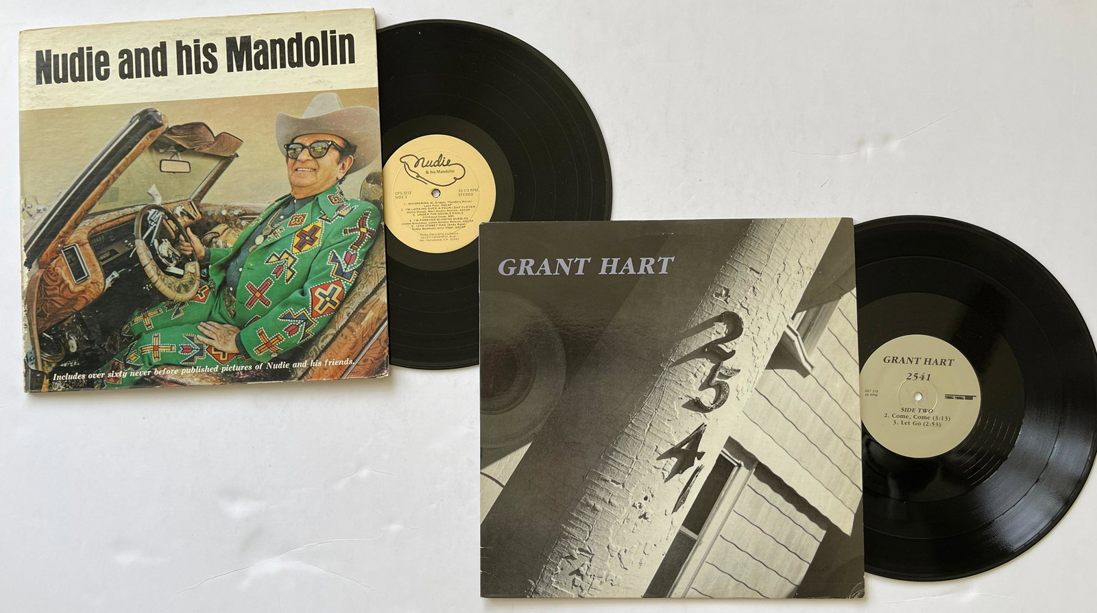 Nudie Cohn - Grant Hart: Nudie Cohn - Nudie And His MandolinLabel:Nudie Recording Company - CFS-3212Format:Vinyl, LP - AND - Grant Hart - 2541Label:SST Records - SST 219Format:Vinyl, 12", 45 RPM, SingleCountry:USReleased:1988