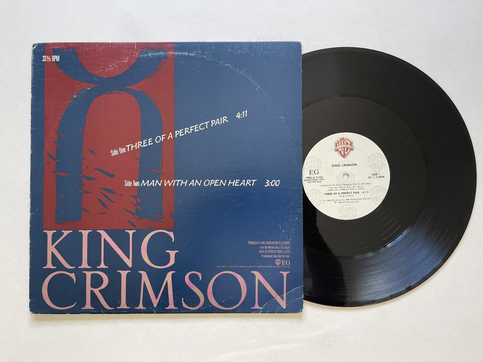 King Crimson - Three Of A Perfect Pair PROMO: King Crimson - Three Of A Perfect PairLabel:EG - Pro-A-2158, Warner Bros. Records - Pro-A-2158Format:Vinyl, Single, 12", Promo