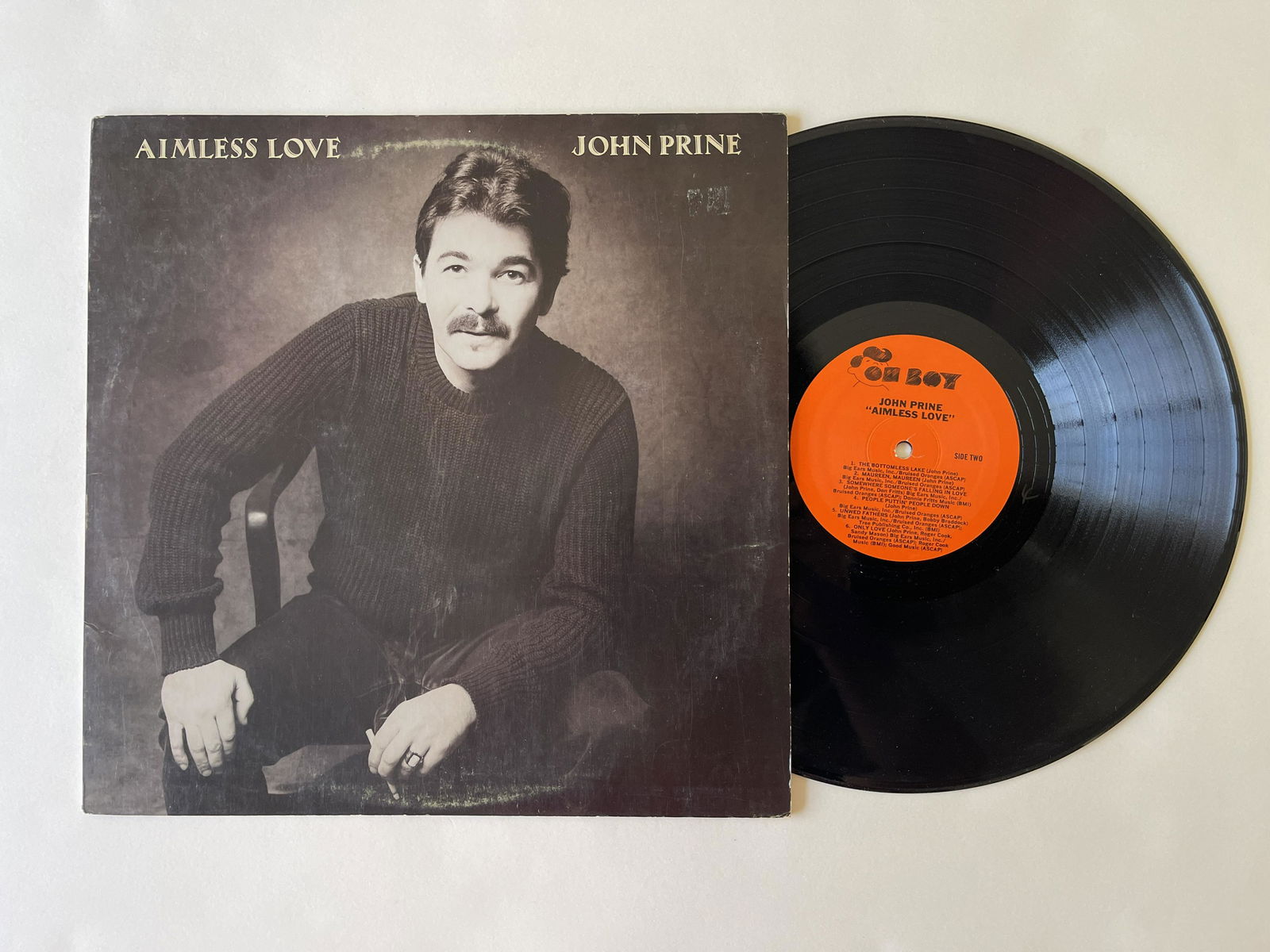 John Prine - Aimless Love: John Prine - Aimless Love. Label:Oh Boy Records - OBR 002. Format: Vinyl, LP, Album. Dec 19, 1984. Genre: Rock, Blues, Pop, Folk, World, & Country