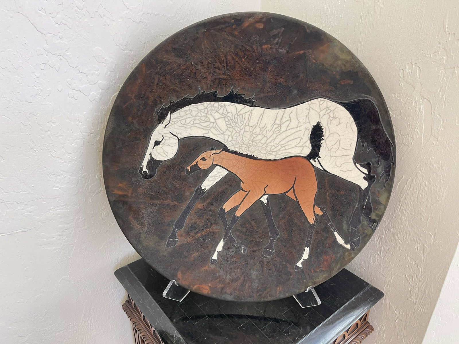 Raku Pottery Platter - HORSES: Raku Pottery Platter - HORSES. Melinda Ishida Forster. A ceramic plate with raku-fired horses by Melinda Ishida-Forster of Marion, Ohio. This plate has a brown background with undertones of gray and r