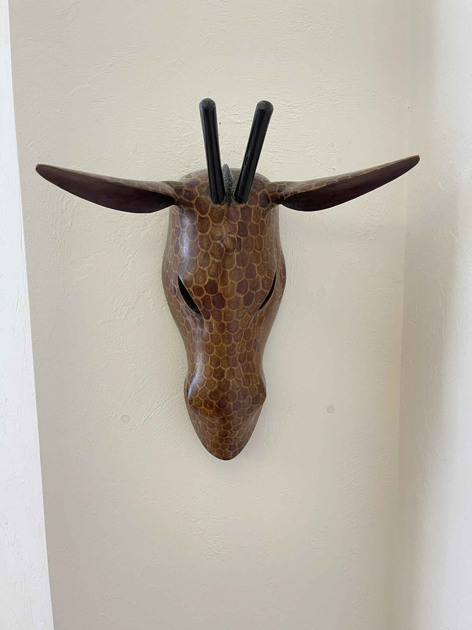 GIRAFFE TRIBAL MASK: Wooden Tribal Giraffe Hand Carved Mask from Kenya 15" tall. Price in 80s when purchased on trip to Kenya was $225 In the case where you have won art that is framed, PashCo offers an unframing service.