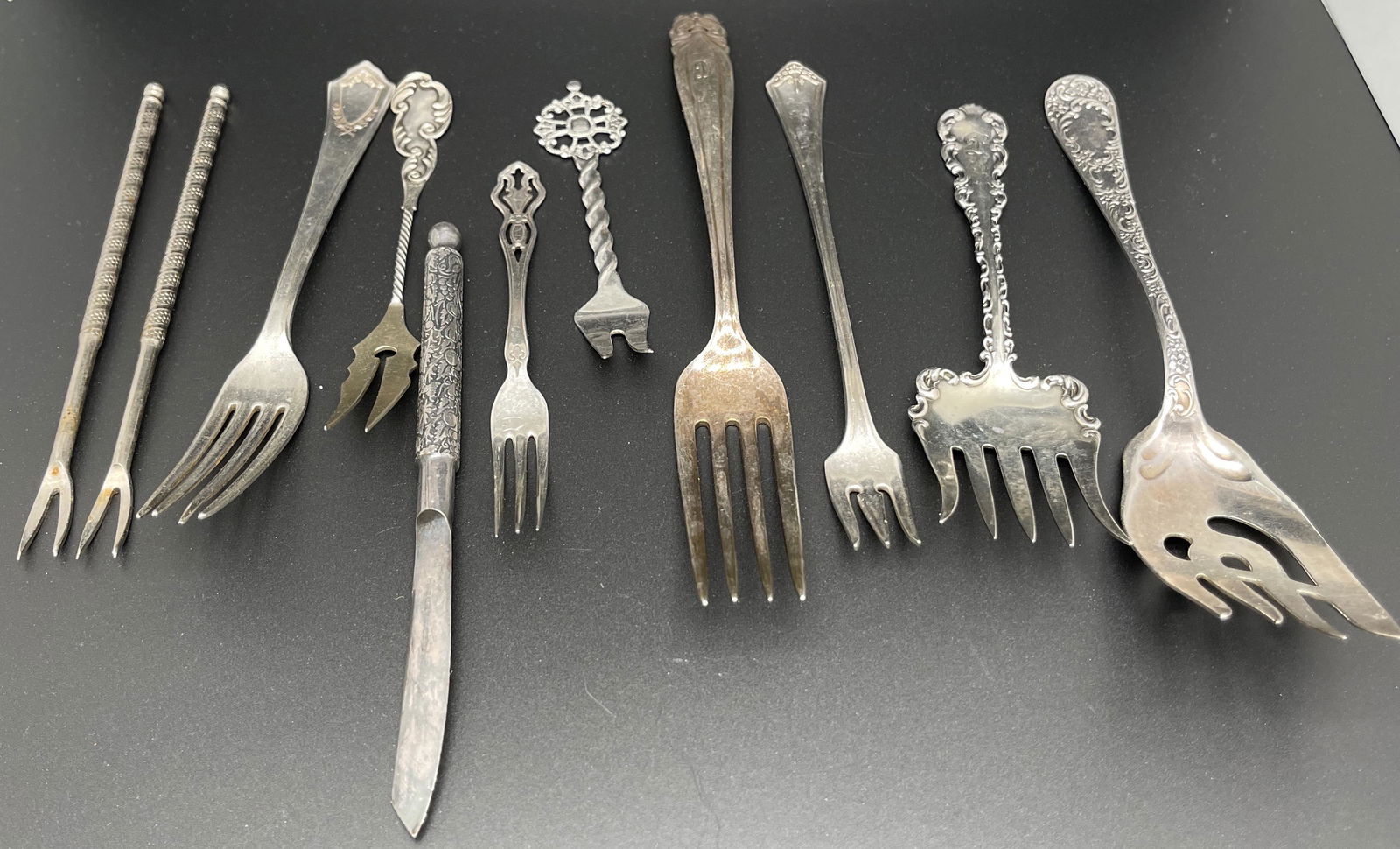 SET OF VINTAGE STERLING FORKS AND POKERS (1 of 5)