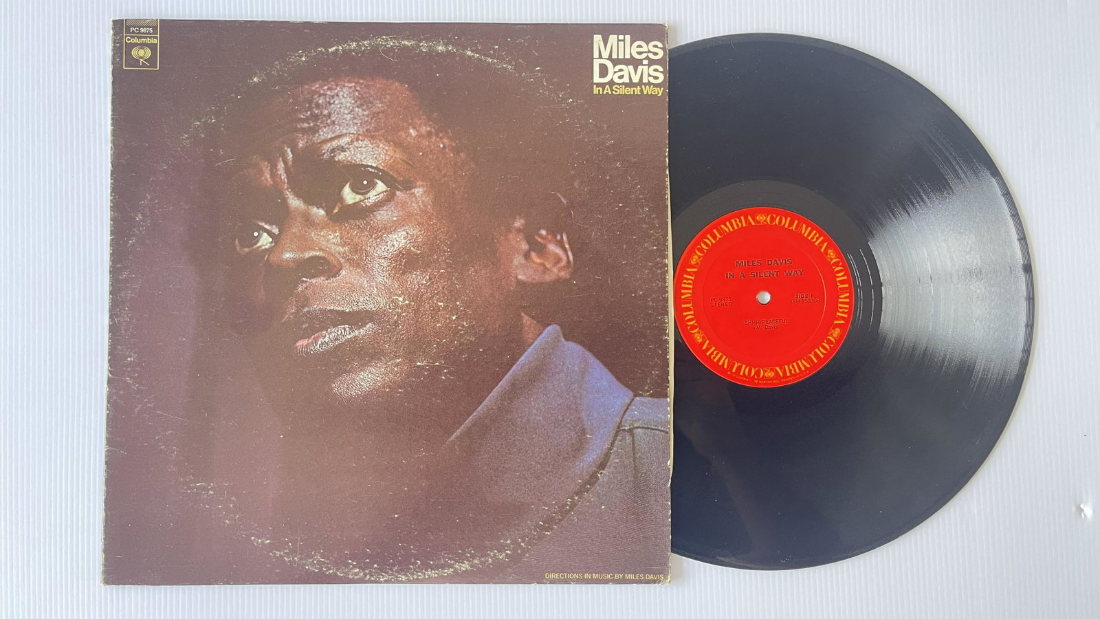 Miles Davis - In A Silent Way: Miles Davis - In A Silent Way Label: Columbia - PC 9875 Format: Vinyl, LP, Album, Stereo Country: US Genre: Jazz Style: Post Bop, Fusion, Modal