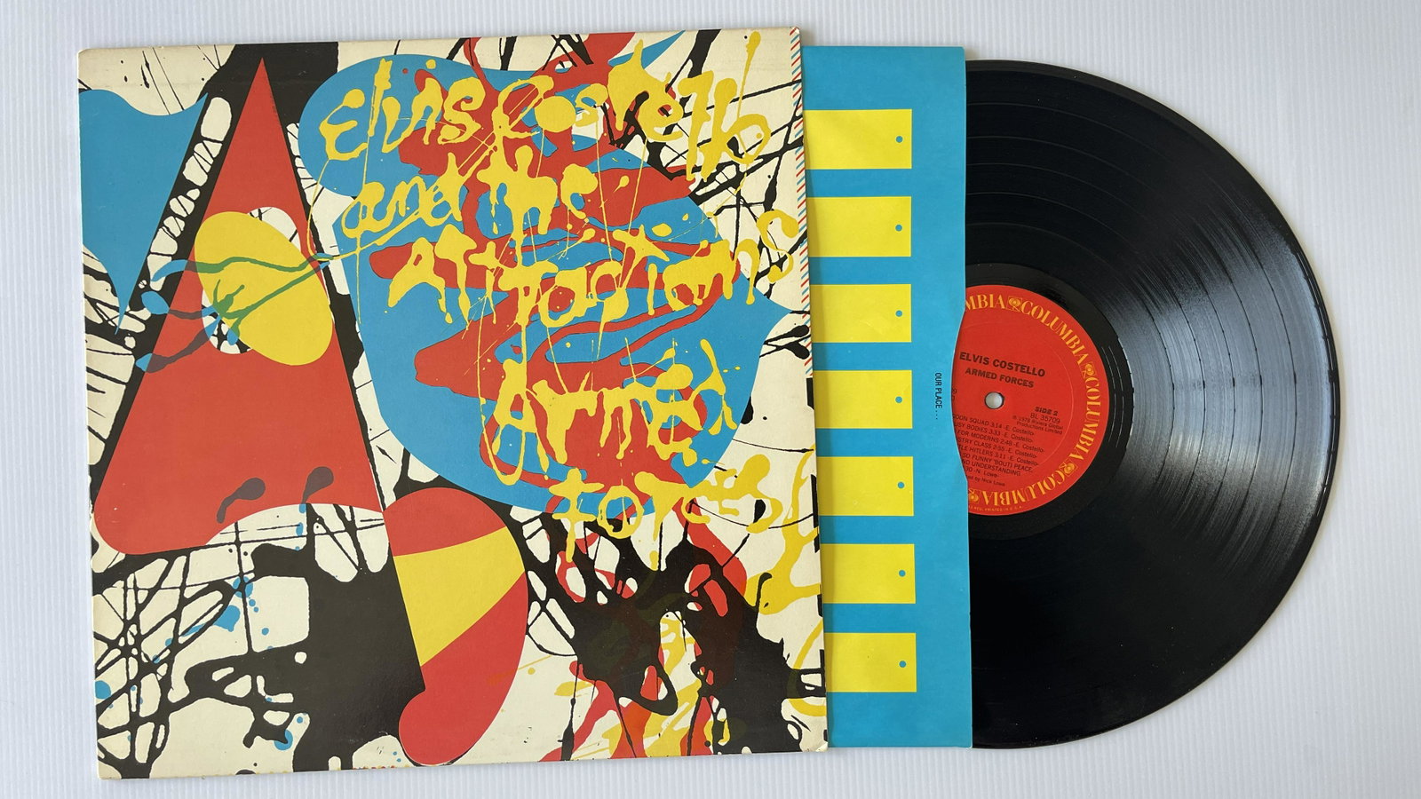 Elvis Costello And The Attractions - Armed Forces: Elvis Costello And The Attractions - Armed Forces Label: Columbia - JC 35709 Format: Vinyl, LP, Album Country: US Released: Jan 5, 1979 Genre: Rock Style: New Wave, Rock & Roll. SLIGHT SCUFF ON RECORD