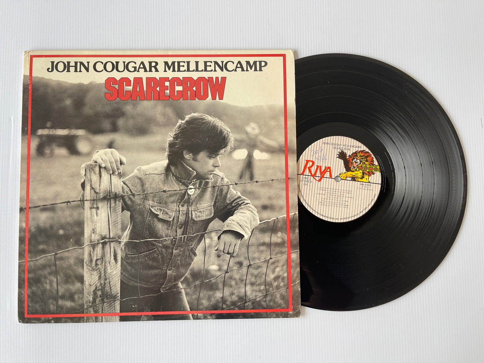 John Cougar Mellencamp - Scarecrow: John Cougar Mellencamp - Scarecrow Riva - IM8 24865