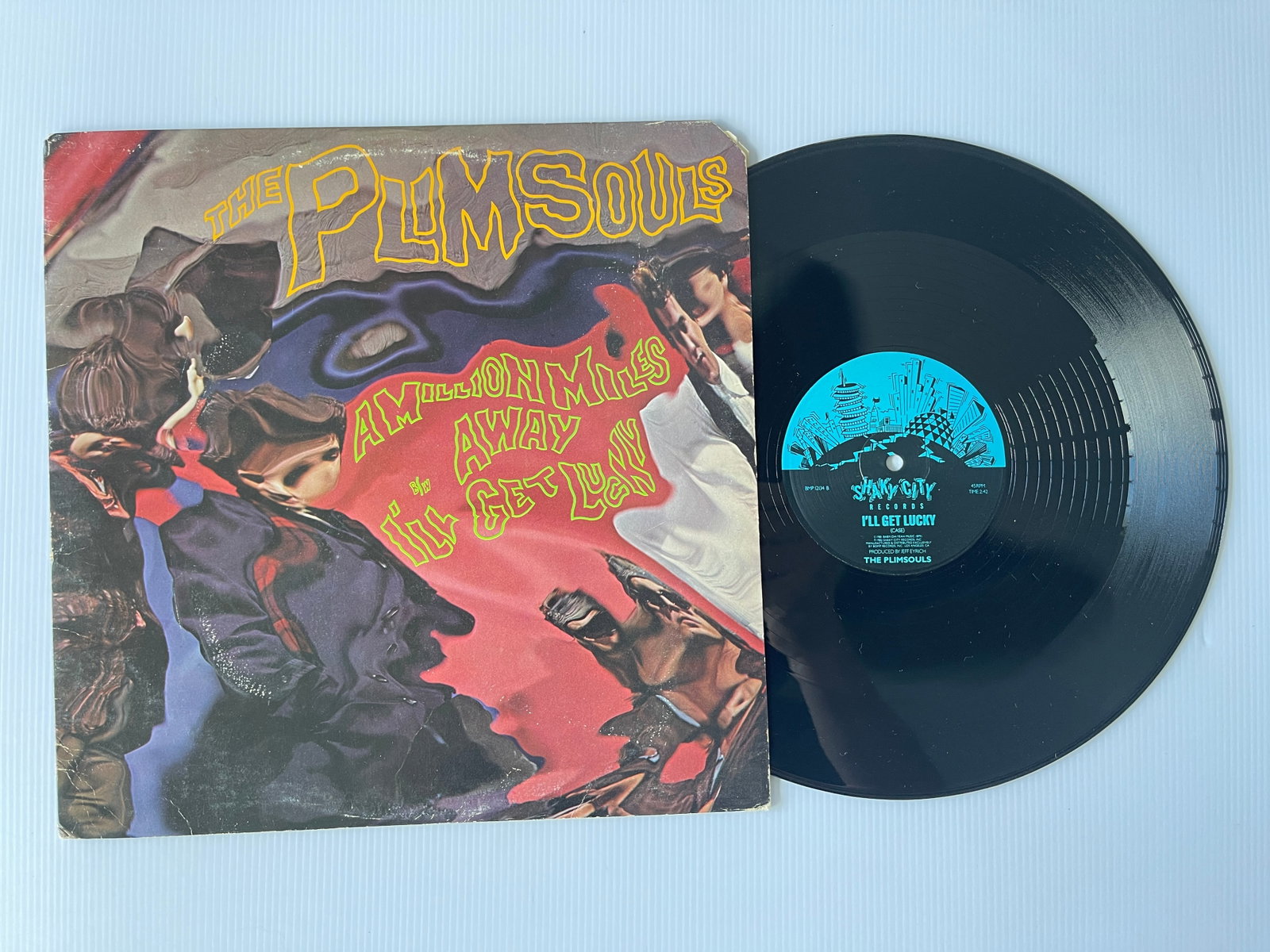 The Plimsouls - A Million Miles Away / I'll Get Lucky: The Plimsouls - A Million Miles Away / I'll Get Lucky Label: Shaky City Records - BMP 12134 Format: Vinyl, 12", 45 RPM, Maxi-Single