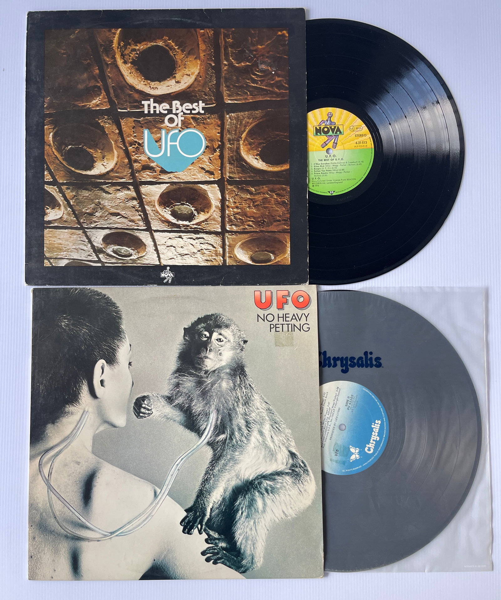 SET OF TWO UFO ALBUMS: UFO - The Best Of UFO Label: Nova - 6.21513 AO Format: Vinyl, LP, Compilation, Repress, Stereo Country: Germany Genre: Rock Style: Hard Rock AND - UFO - No Heavy Petting Label: Chrysalis - PV 41103