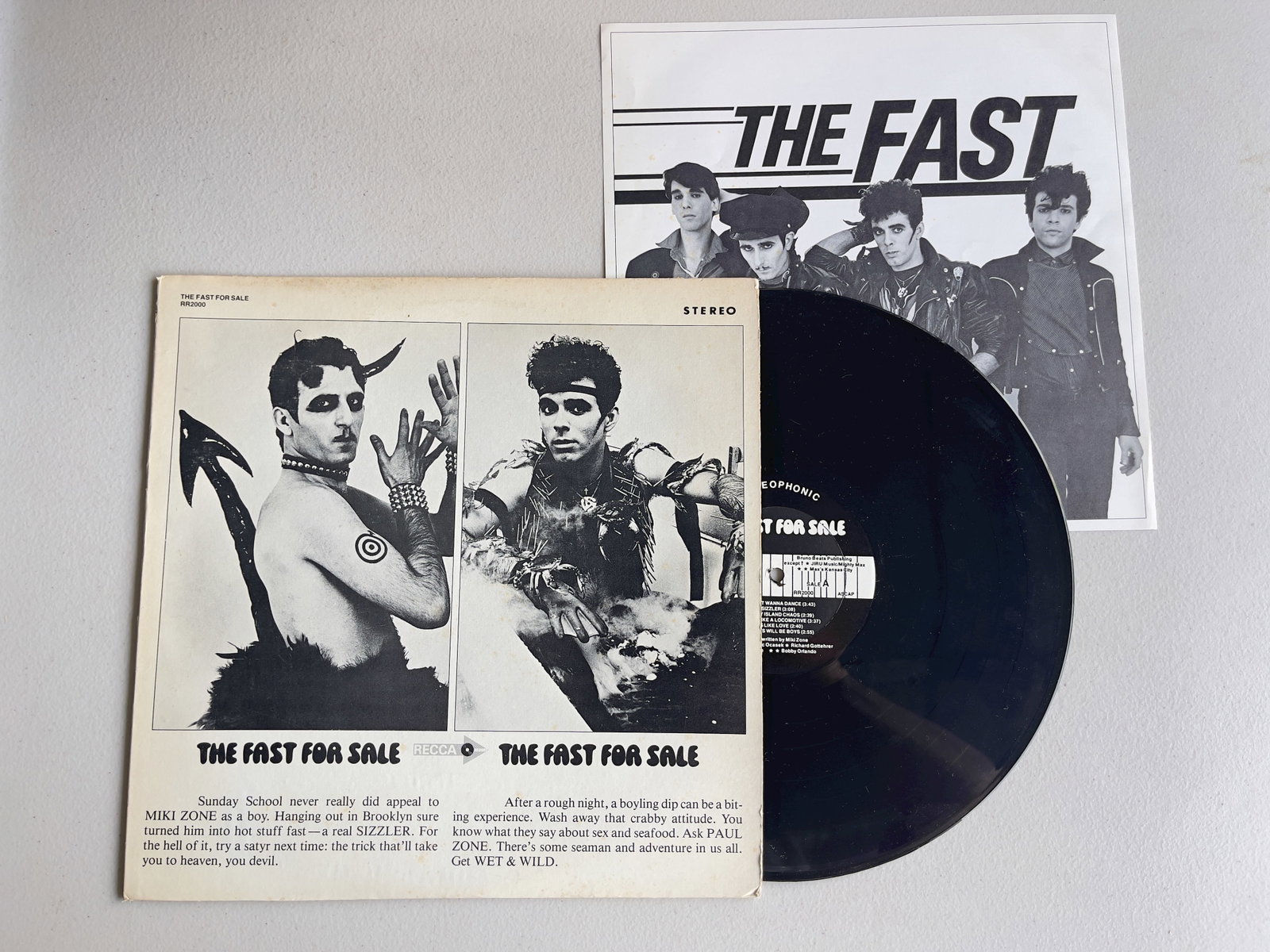 The Fast – The Fast For Sale $$ GLAM PUNK: The Fast – The Fast For Sale ($21 - $52) - US American glam/punk band formed in New York City in the mid 1970s by brothers Paul Zone, Miki Zone, and Mandy Zone.