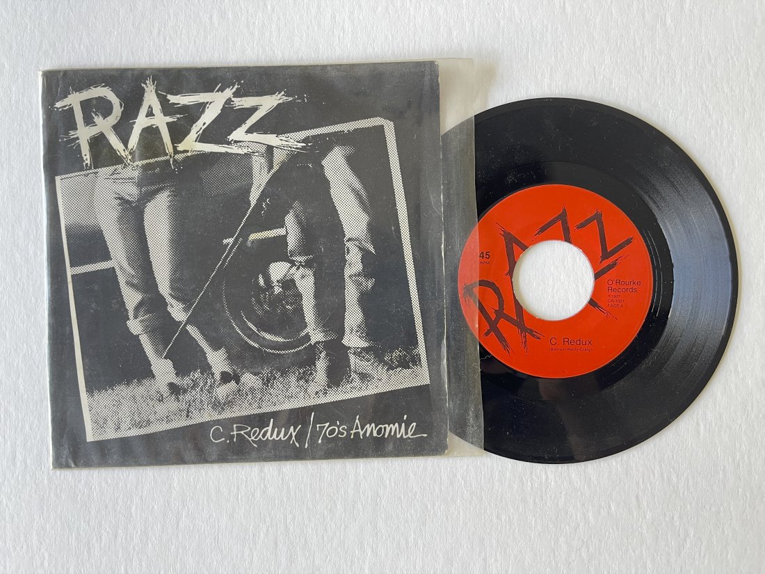 Razz – C.Redux / 70's Anomie - punk glam 45rpm: Razz – C.Redux / 70's Anomie Label:O'Rourke Records – OR-1001 punk glam Washington DC power punk / hard rock band