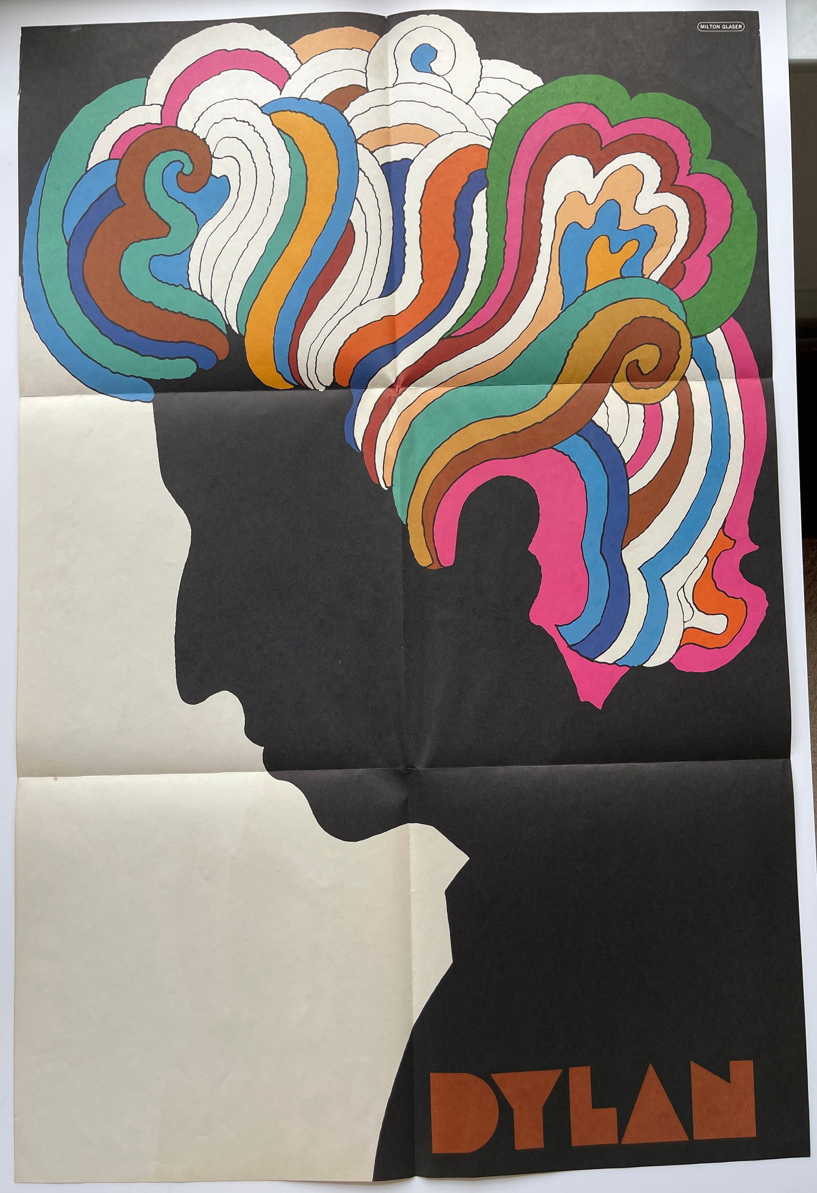 BOB DYLAN - MILTON GLASER: BOB DYLAN - MILTON GLASER folded as distributed. Original 1966 poster from Greatest Hits. About 22 x 33. Perfect example for framing.