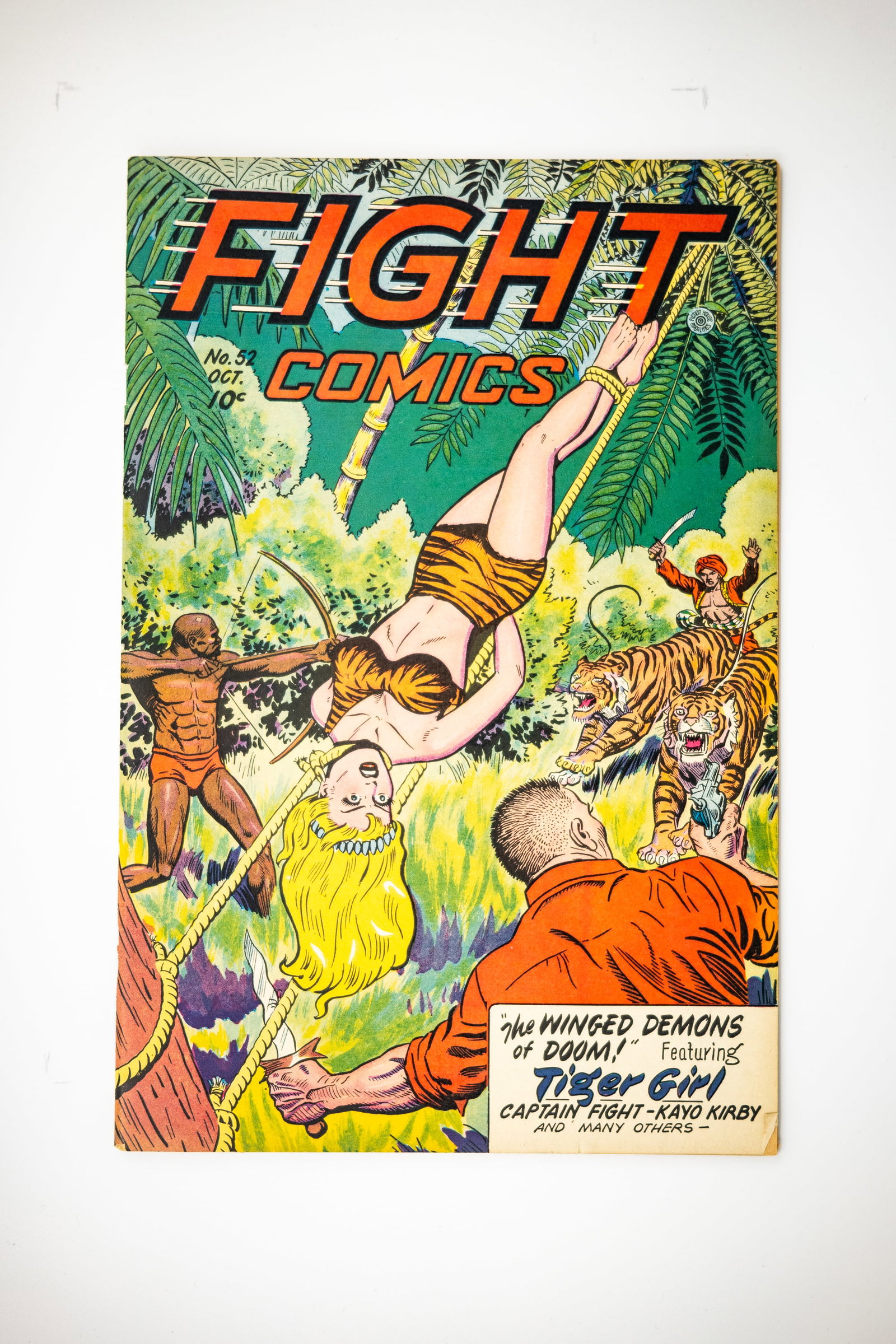 Fight Comics #52 (Fiction House, 1947): Fight Comics #52 (Fiction House, 1947) Joe Doolin bondage cover. Topless woman panels. Matt Baker, Nick Cardy, and Jack Kamen art. Overstreet 2023 FN 6.0 value = $93; VF 8.0 value = $182. Recent CGC 6