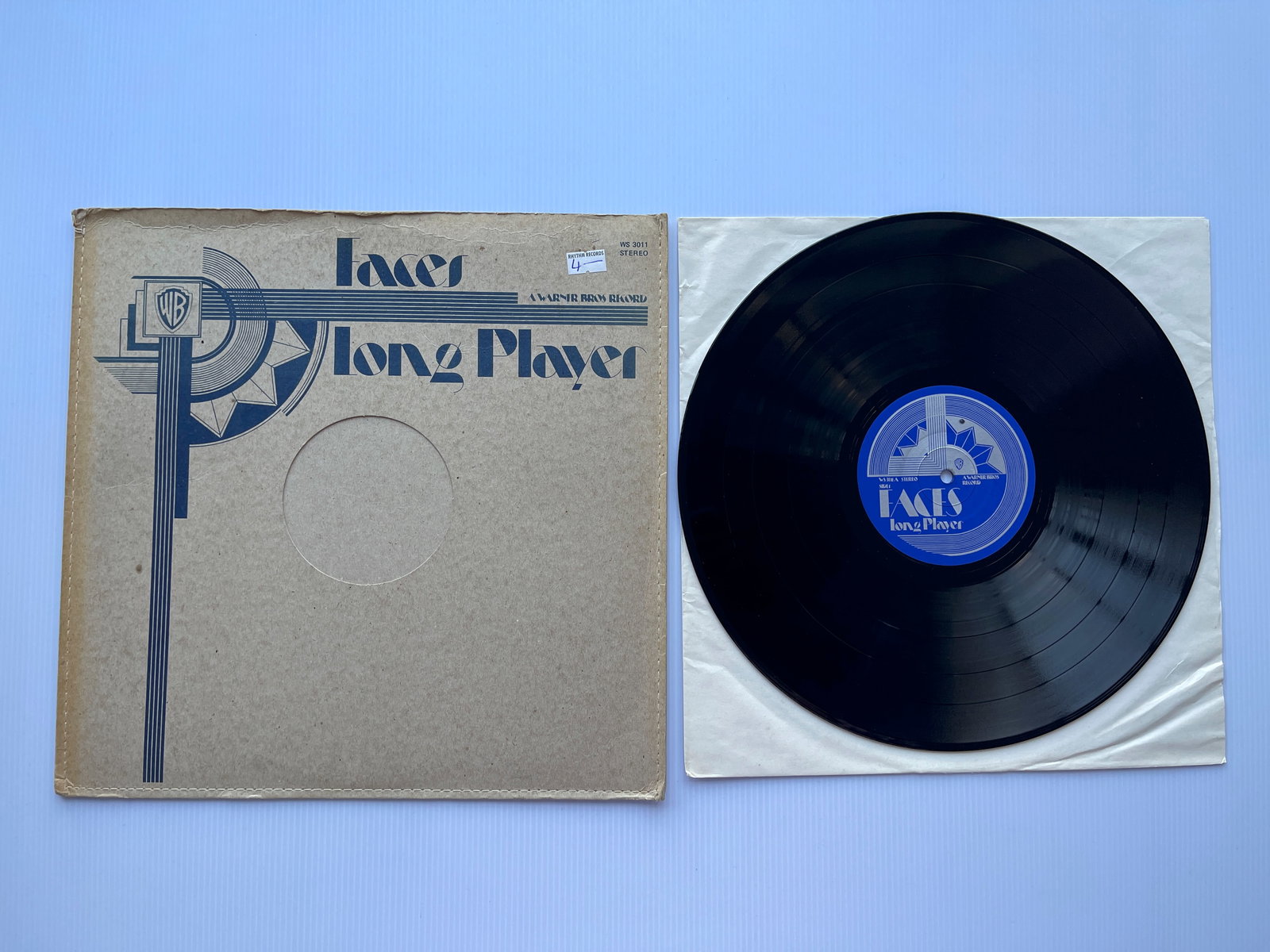 Faces - Long Player: Warner Bros. Records - WS 3011 - Faces - Long Player - RON LANE, KENNY JONES, DAVE PALMER, RON WOOD, ROD STEWART. Issued in a die-cut heavy card sleeve designed to look like a vintage shellac release 